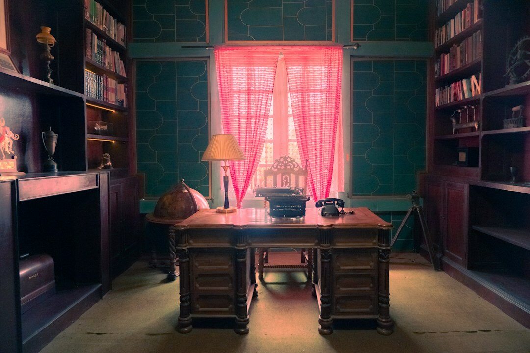 writer at desk with notebook